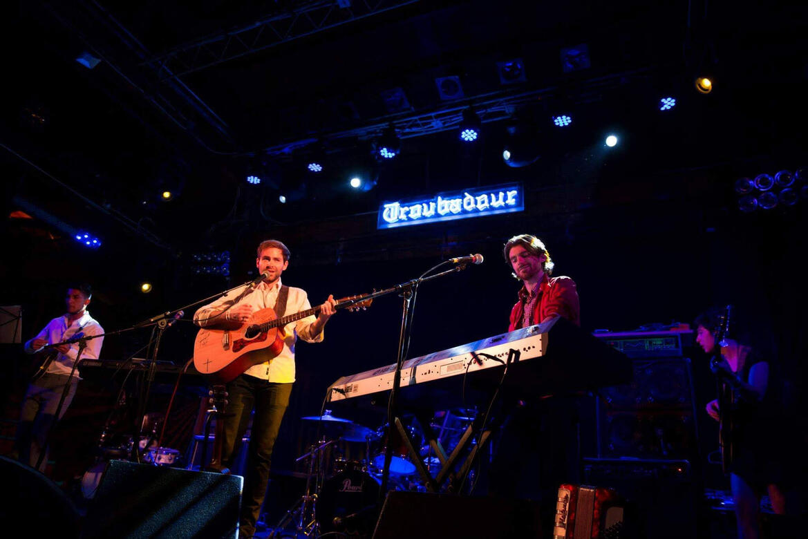Charles McDonald singing and playing guitar at the Troubadour in West Hollywood, CA